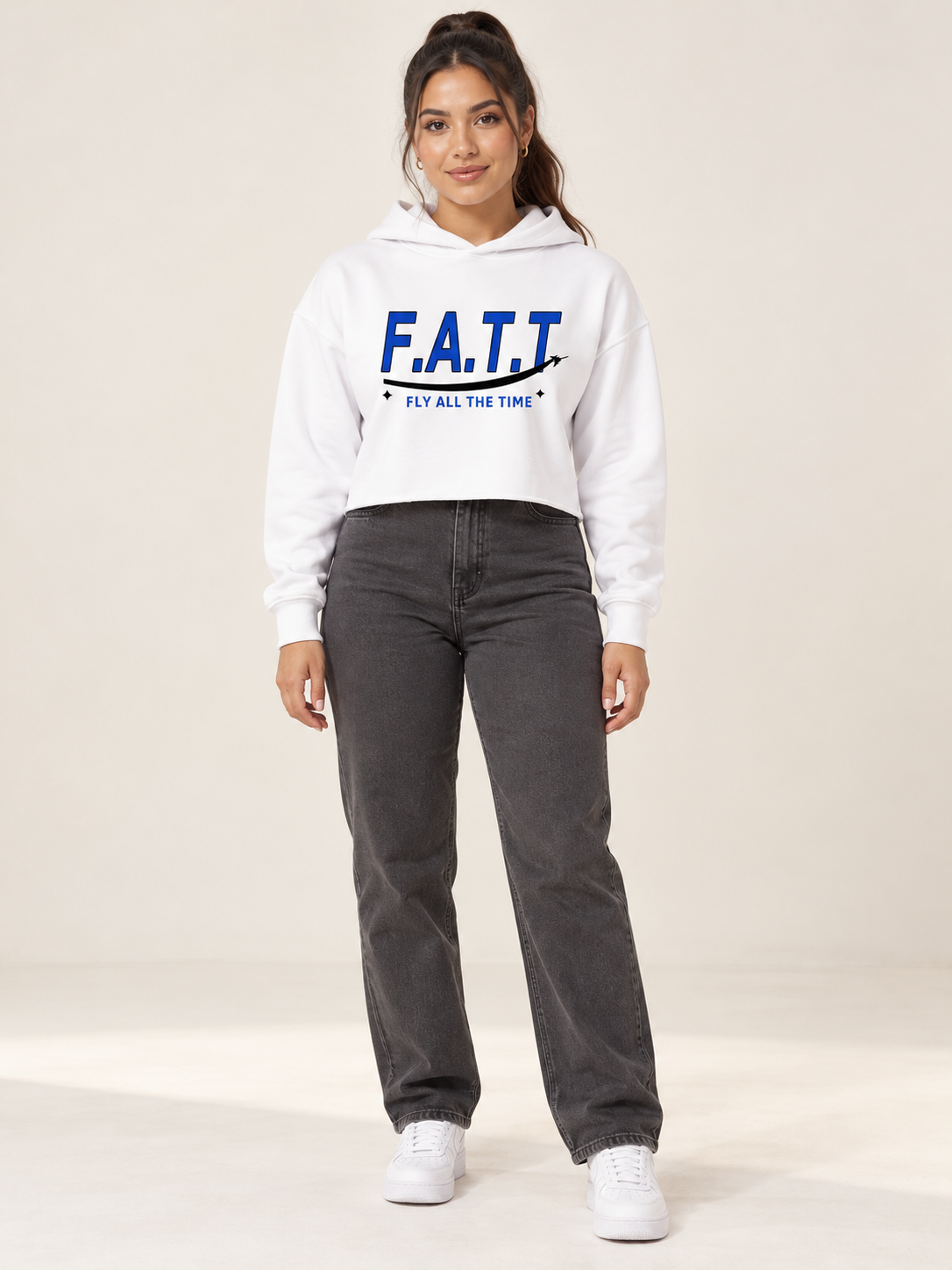 AI styling mockup — F.A.T.T Women's Flight Cropped Hoodie on an adult model. See product photos for garment details.
