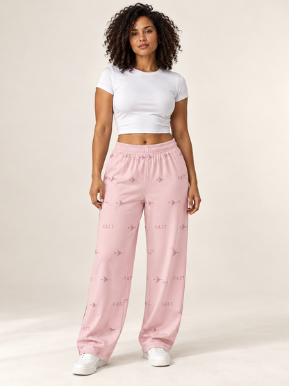 AI styling mockup — F.A.T.T Women's Flight Lounge Pants — Blush / Burgundy on an adult model. See product photos for garment details.